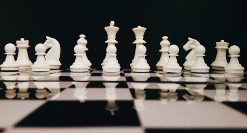 https://www.pexels.com/photo/white-chess-piece-on-top-of-chess-board-814133/